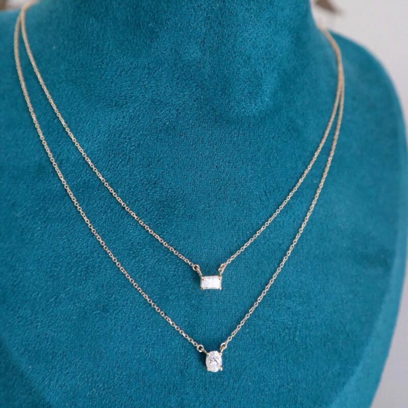 18k gold necklace with a lab-grown diamond in oval or baguette cut.